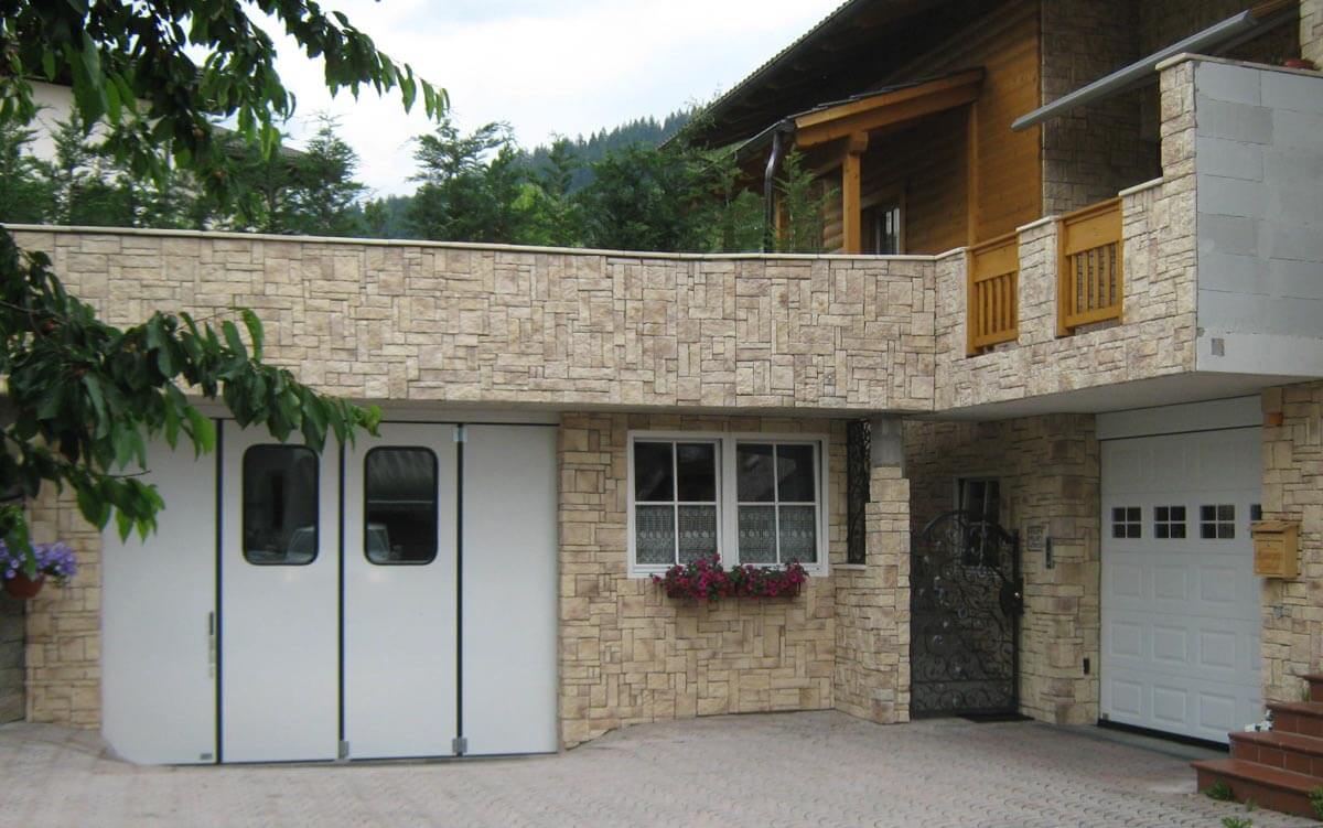 Portoni per garage a libro Gazzini-1
